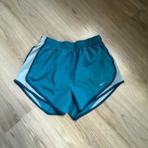 Blue Nike shorts, women’s small